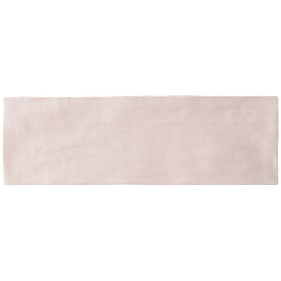 A rectangular, pink Serena 3" x 8" subway tile with a smooth finish, ideal for enhancing floors or accent walls, shown against a white background.
