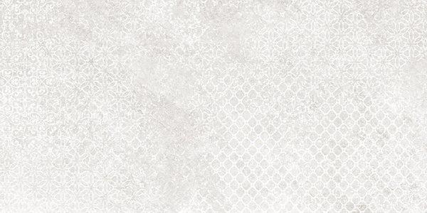 Shyft 12x24 Lace Deco features a pale off-white background with subtle geometric and floral lace patterns, creating a refined, elegant look inspired by vintage wallpaper and rectified porcelain tile.