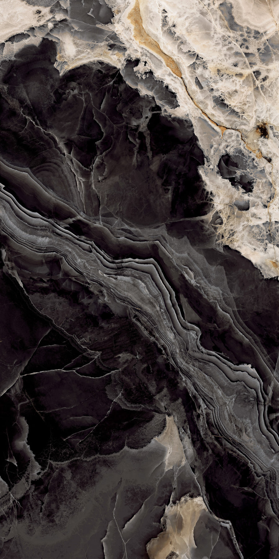 Marble surface with swirling black, white, and tan veins running diagonally, creating an abstract, natural pattern with contrasting light and dark areas.