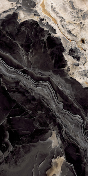 The Donatello 24x48 Porcelain Tile features a black and white marbled surface with wavy patterns and touches of beige and gray, capturing the sophisticated look of Italian marble in a large format rectified porcelain tile.