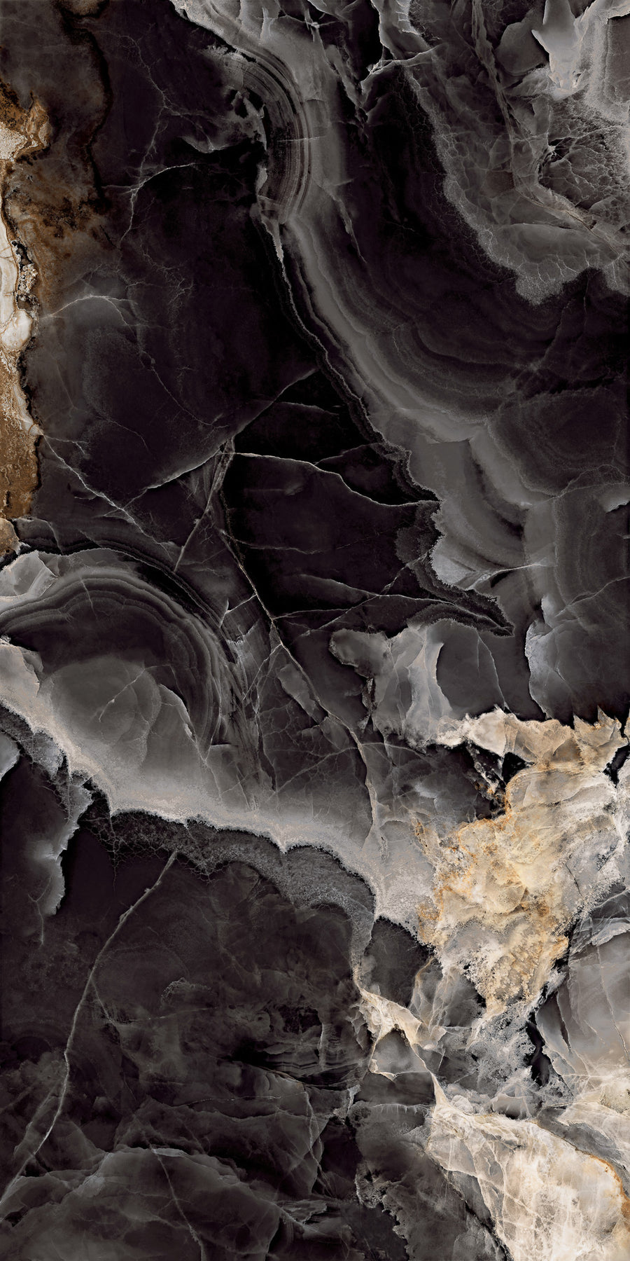 Abstract close-up of black marble with swirling patterns of gray, white, and hints of brown. The texture appears smooth and glossy, with natural veining and layered stone formations throughout the surface.