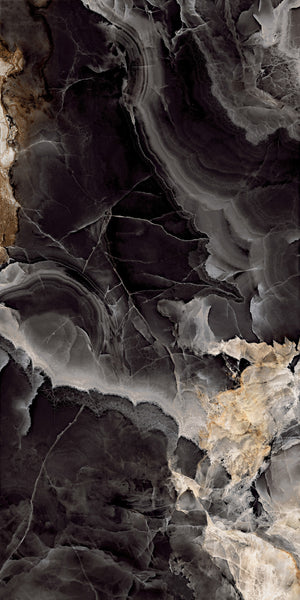 Abstract close-up of dark black and gray marble with swirling patterns and veins, accented by lighter shades and touches of brown and beige, resembling natural stone textures.
