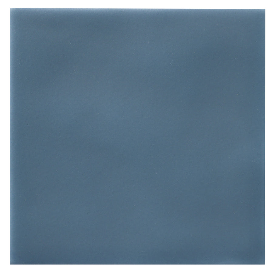 The Zephyr 4x4 Ceramic Tile features a smooth matte finish and comes in a muted Mediterranean blue.