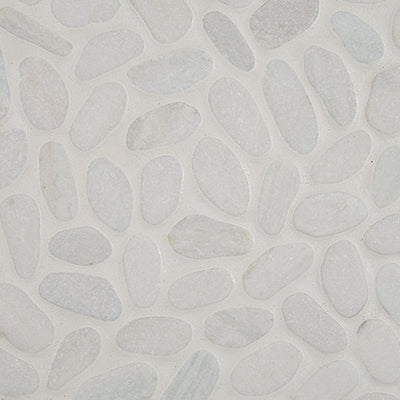 A close-up of the White Pebbles Tile in White Pebbles color, featuring smooth oval stones set closely together on a light background—an elegant, modern choice for contemporary flooring.