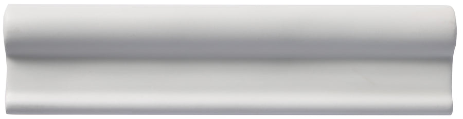 The Zephyr 2x8 Rail Molding Ceramic Tile is a white, rectangular tile featuring a curved decorative profile, exuding handcrafted luxury, and is shown against a plain white background.