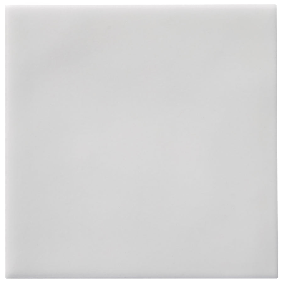 The Zephyr 4x4 Ceramic Tile is a plain, square, white ceramic tile with a smooth surface and subtly rounded edges—ideal as a special-order option for Mediterranean-inspired spaces.