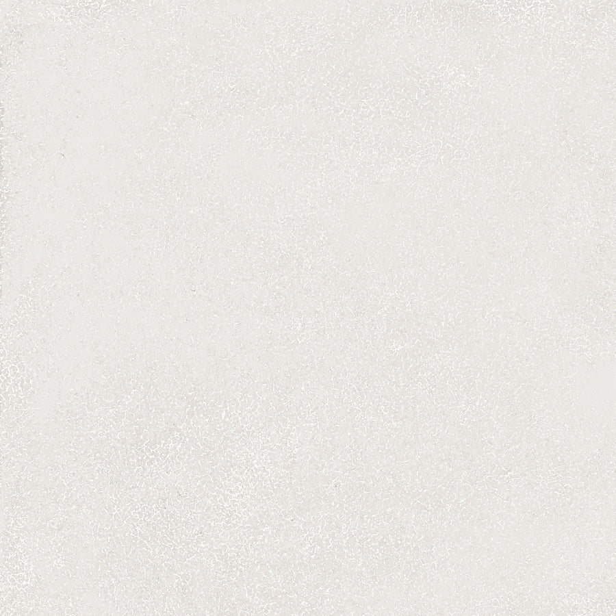 A plain, light gray textured surface with subtle shading, similar to concrete or rough paper, creates a calming look—much like the Avanti 12x12 Glazed Porcelain Tile. No distinct patterns or objects are visible.