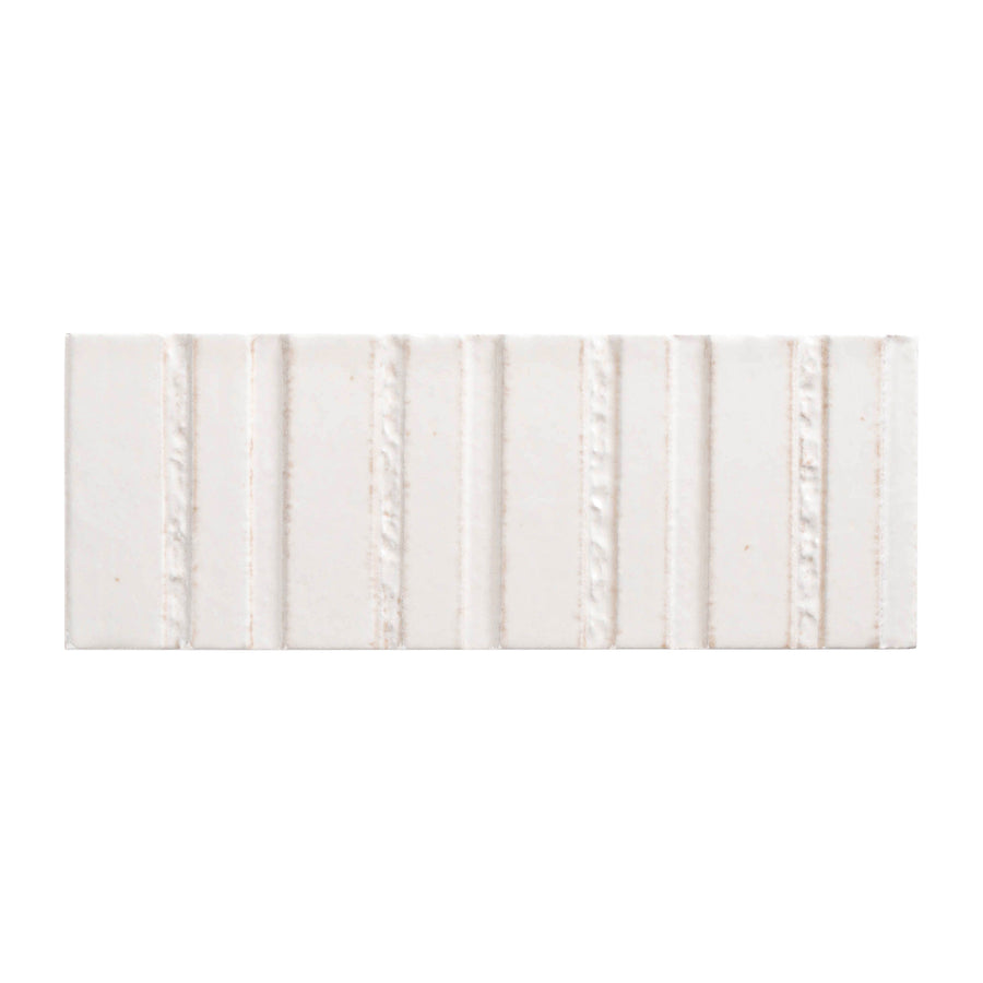 The Sarmento 3" x 8" Deco Subway Porcelain Tile in Arden features a rectangular shape with linear vertical textured and smooth stripes on a plain white background.