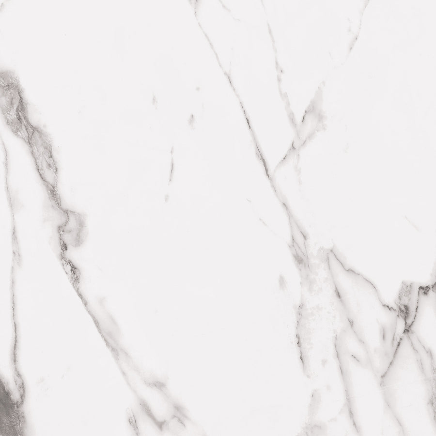 White marble surface with subtle gray veining patterns running diagonally, creating a smooth, elegant texture. The veins are thin and irregular, highlighting the natural appearance of the stone.
