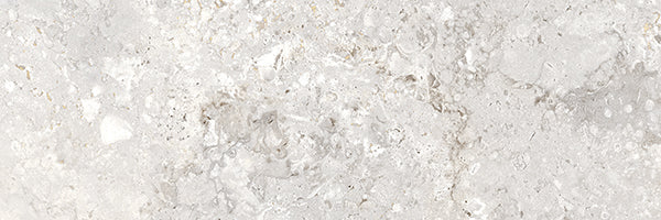 A close-up of the Stream 4x12 Rectified Porcelain Tile showcases its smooth surface and intricate veining, inspired by premium travertine and enhanced with 3D Shaped Technology.
