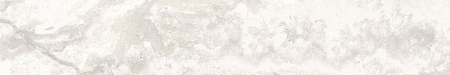 The Stream 4x24 Rectified Porcelain Tile features a light gray and white marbled surface with subtle veining and textured patterns, closely resembling natural stone or travertine.