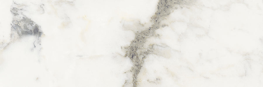 The Renaissance 4x12 Polished Porcelain Tile features a white marble look with delicate gray and beige diagonal veining, offering the refined elegance and natural pattern of stone slabs, perfect for luxurious countertops or flooring.