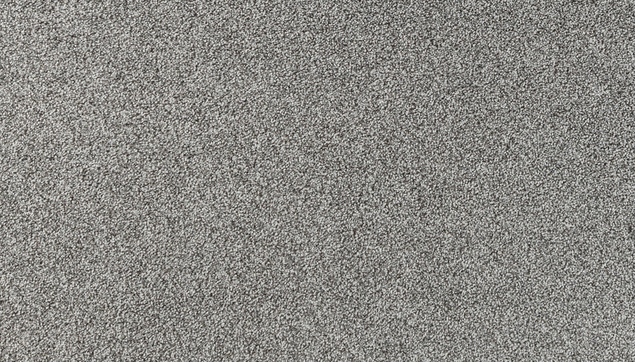 Close-up of Salinas Valley II Pet Friendly Carpet in Twilight—a textured, gray, glittery surface with a sparkling finish, ideal for luxury flooring in sophisticated spaces or high-traffic areas.