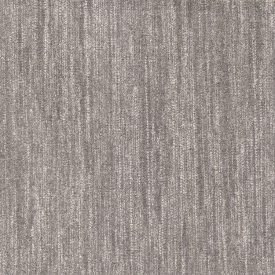 Saltmeadow On Trend Carpet features a gray, subtly mottled surface with soft vertical stripes, offering a durable and modern neutral look ideal for contemporary spaces seeking lasting style and comfort.