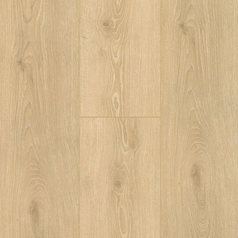 Beachside Collective 7 1/2" Waterproof Laminate in Sand Dune features a light oak look with natural grain, knots, and subtle lines. Vertically aligned planks in pale beige create a smooth, uniform surface for effortless coastal style.