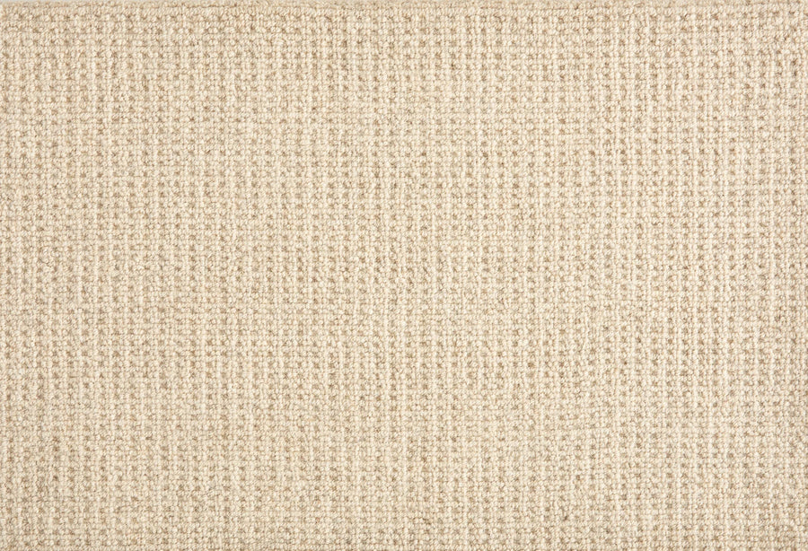 Close-up of Martina Berber Carpet in Sand, featuring a subtle grid pattern and woven texture—ideal for contemporary spaces and durable flooring in high-traffic areas.
