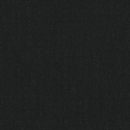 A close-up of Homage Berber Carpet in Savoy shows its black textured fabric with faint vertical lines, offering a soft feel and subtle pattern—ideal for adding understated elegance to high-traffic spaces.