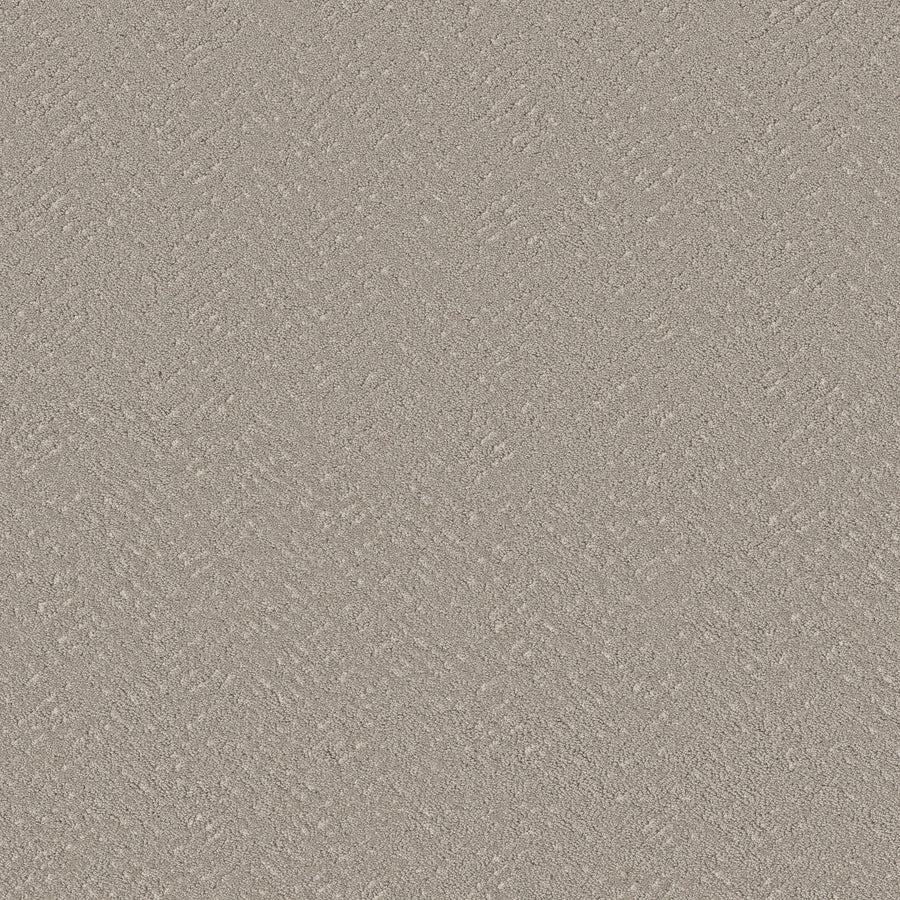 Close-up view of Favoured Path Pet Friendly in Sculpture—a textured, light beige surface with a subtle diagonal pattern. Its rough, granular finish is perfect for commercial flooring, combining durability with contemporary style.