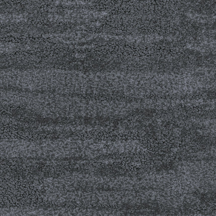 Close-up of Cirrus Berber Carpet in Sea color, featuring a dark gray, mottled pattern and plush texture that evokes the look and feel of premium synthetic flooring.