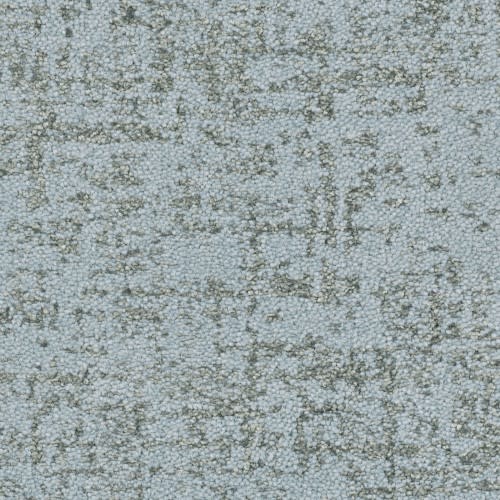 The Hollywood Nights On Trend Carpet in Sea Spray features a light blue-gray textured finish with an abstract, darker pattern, offering a subtle distressed look and premium durability for stylish, luxurious flooring.