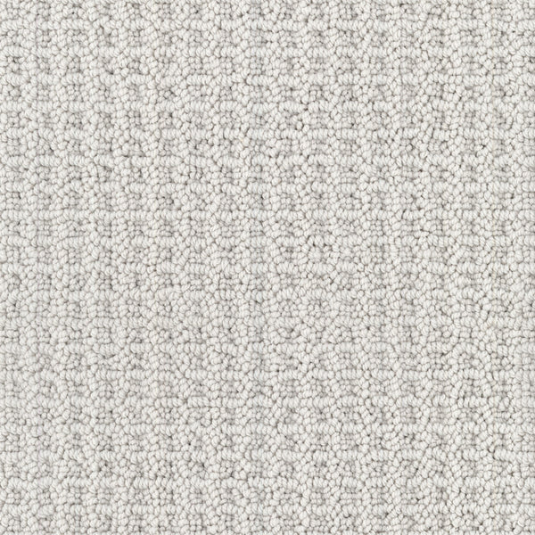 Close-up of Seascape Berber Carpet, a light grey, loop-textured carpet featuring tightly packed, small rounded loops made from durable Envision nylon for a soft and uniform surface pattern.