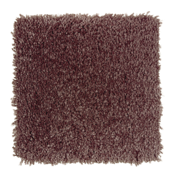 A square sample of Sensible Style III Family Friendly Carpet in the rich Mademoiselle hue, featuring plush, textured fibers for modern style and comfort, displayed on a white background.