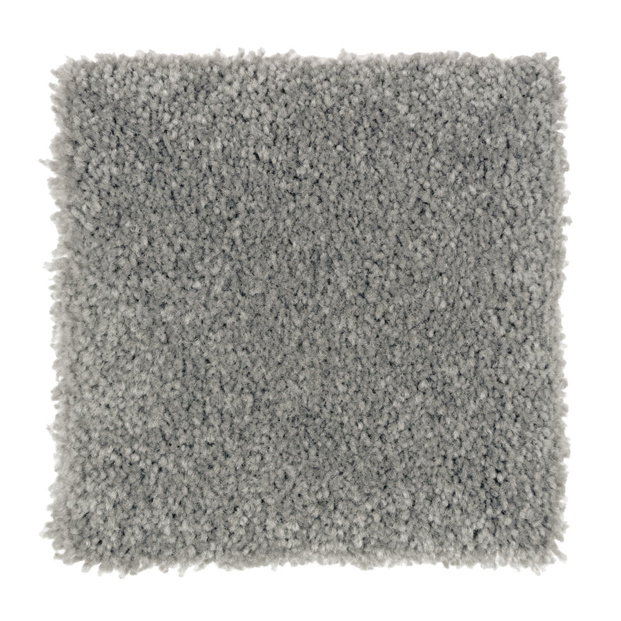 A square sample of Sensible Style III Family Friendly Carpet in Michelangelo, featuring a light gray, plush, textured surface—ideal for everyday comfort and a modern touch to your space. Shown against a white background.
