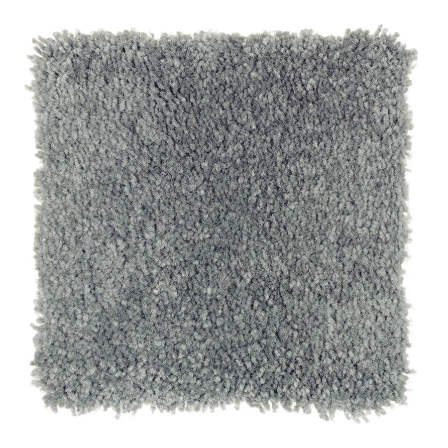 A square swatch of Sensible Style III Family Friendly Carpet in Sardinian Sea, featuring a plush, shaggy texture and soft surface—ideal for everyday comfort in modern spaces.