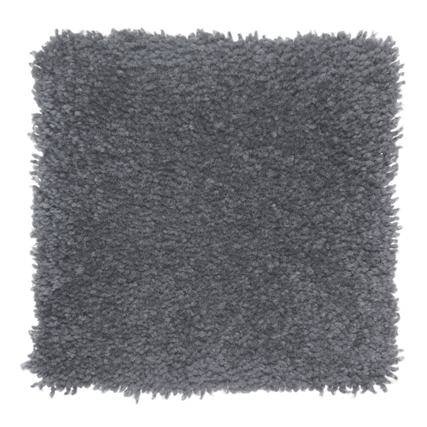 A square sample of Sensible Style III Family Friendly Carpet in Royal, featuring dark gray plush texture and thick, soft fibers—ideal for contemporary style and daily comfort, shown against a white background.