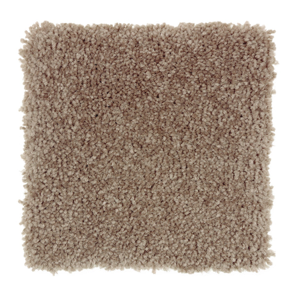 A square sample of Sensible Style III Family Friendly Carpet in Fishers Warf color features plush, textured, thick, and soft light brown fibers for everyday comfort, shown against a white background.