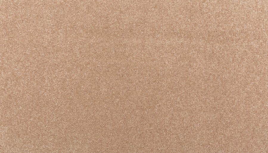 A close-up view of the Sensible Style III Family Friendly Carpet in Spiced Tea, featuring a light brown, subtly textured surface—ideal for bringing everyday comfort and modern style to any space.