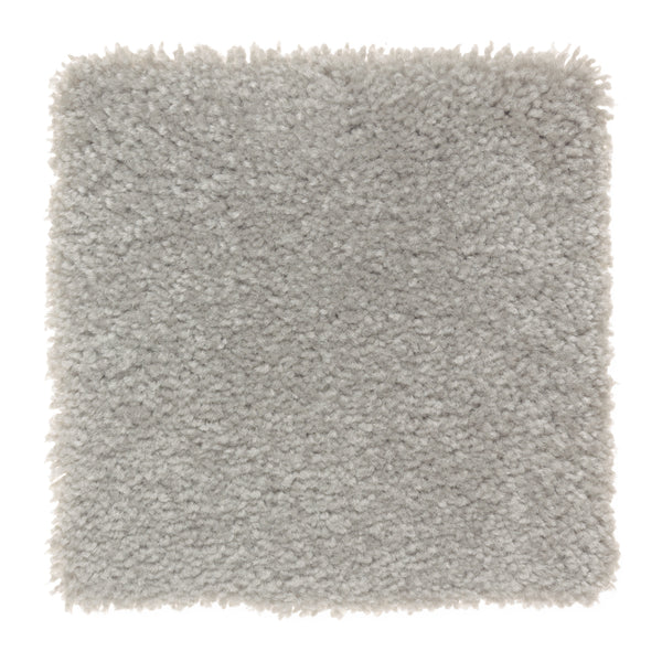 A square sample of Sensible Style III Family Friendly Carpet in Silver Spoon shows its soft, plush, light gray textured surface, photographed from above on a white background for everyday comfort.