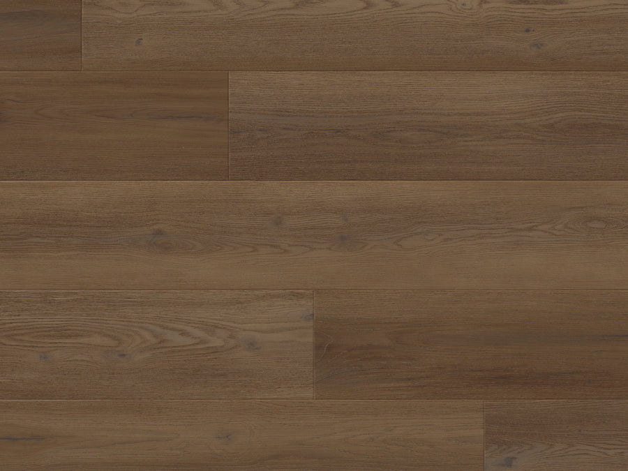 Close-up of Art Select Click 9" Vinyl Plank in Seranno Oak—brown planks with natural grain and varied shades, arranged horizontally in a click-lock layout for a durable vinyl flooring solution.