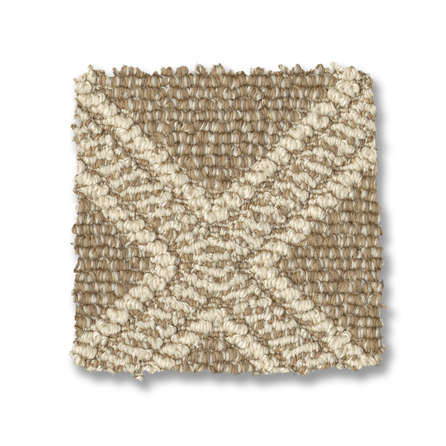 The Scout Pet Friendly Carpet is a square beige and off-white swatch featuring an X-shaped diamond pattern, made with durable yarn for long-lasting use.