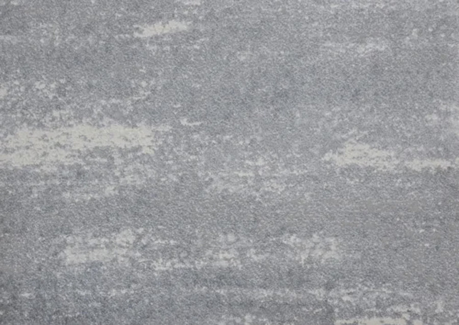 A close-up of Rock And Roll On Trend Carpet in Shadow shows its textured gray surface with subtle variations—perfect for high-traffic areas needing both durability and modern appeal.