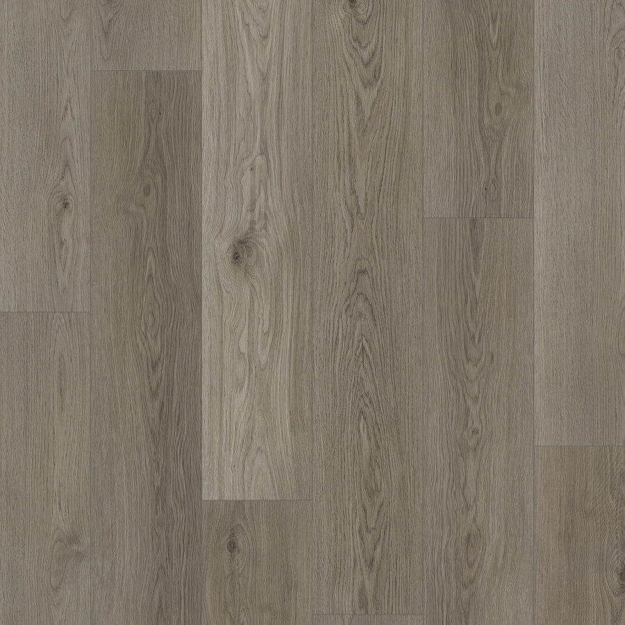 Close-up view of Coretec Pro Plus Enhanced Vinyl flooring panels, showcasing a grayish-brown tone with natural wood grain patterns, knots, and subtle color and texture variations for an elegant finish.