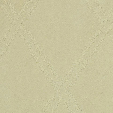A close-up of the Braided Opulence Berber Carpet in Shell, showcasing its luxurious feel with a subtle diamond pattern formed by gently raised textured lines.