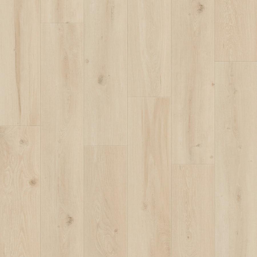 Light wood floor with natural grain and subtle knots, featuring Coretec Retro Revival 9" Vinyl Plank in Silken Timber Oak. Long planks installed parallel offer a vintage look, smooth pale beige finish, and durable vinyl construction.