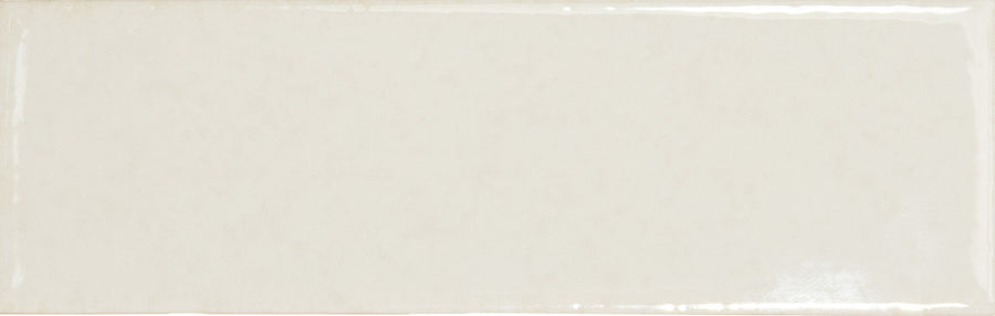 The Skin 1.6" x 5" Matte Subway Tile is a rectangular off-white ceramic tile featuring a subtle texture and beveled edges, perfect for creating a timeless look in any space.