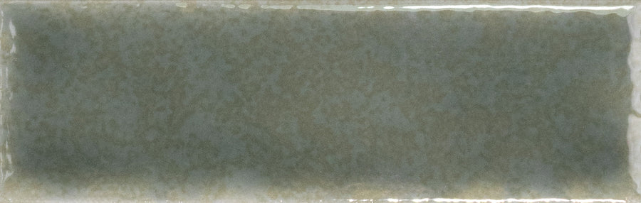 The Skin 1.6" x 5" Matte Subway Tile is a rectangular ceramic tile in muted olive green, featuring a matte finish and smooth, slightly uneven edges—an elegant choice for timeless design in any space.