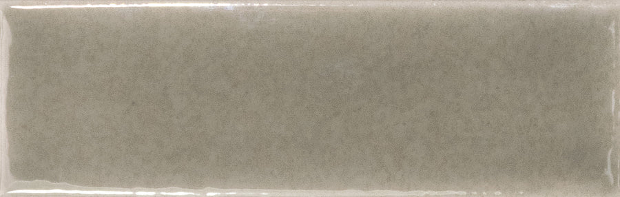 Skin 1.6" x 5" Matte Subway Tile features a rectangular shape in a subtle light gray-beige hue with slightly uneven edges and a smooth, matte finish, offering an elegant, timeless design for any space.