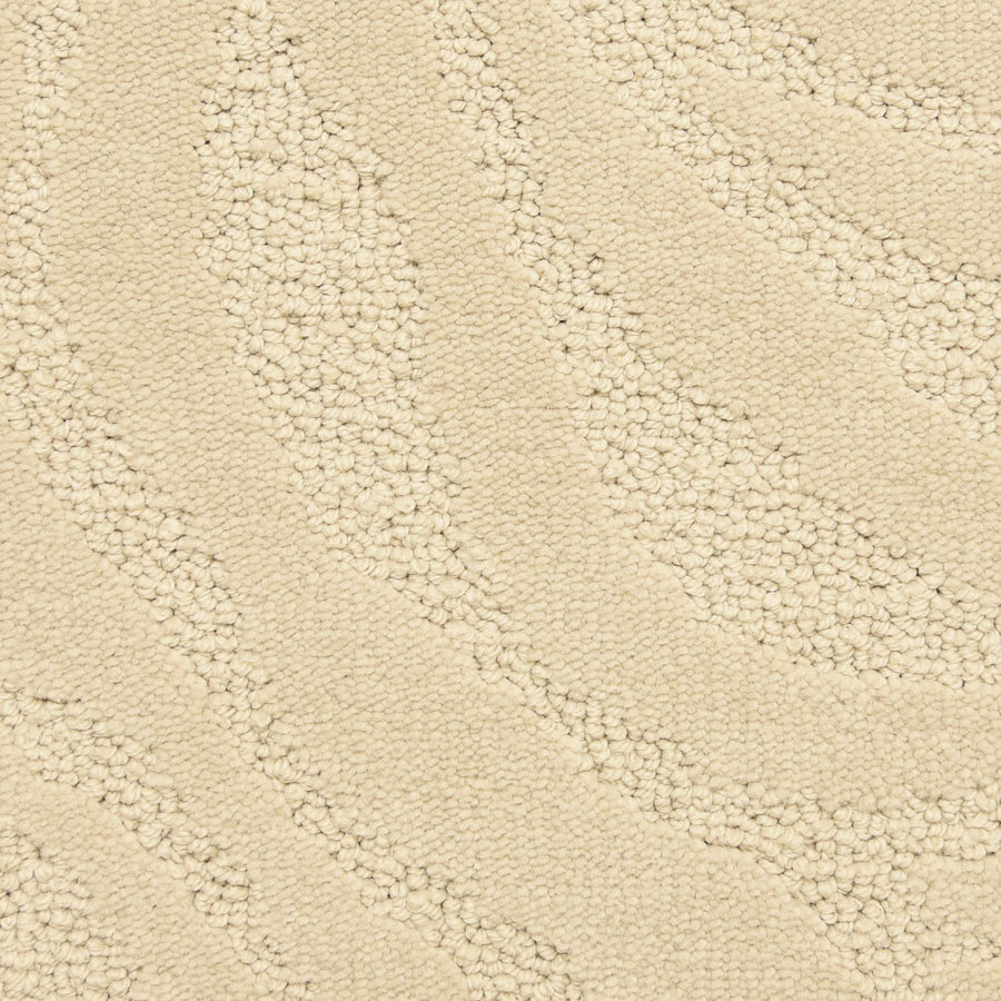 Close-up of Capetown On Trend Carpet in Snow Lion, featuring a textured beige surface with a subtle wavy, raised pattern. This soft, plush carpet is ideal for high-traffic areas and adds stylish appeal to modern interiors.