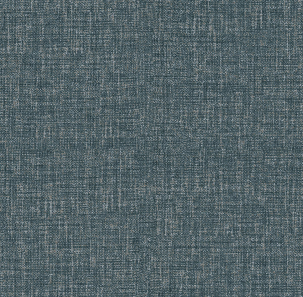 A close-up of Somerton On Trend Carpet in Indigo shows its woven, slightly distressed look with interwoven light and dark blue threads forming a contemporary crosshatch pattern.