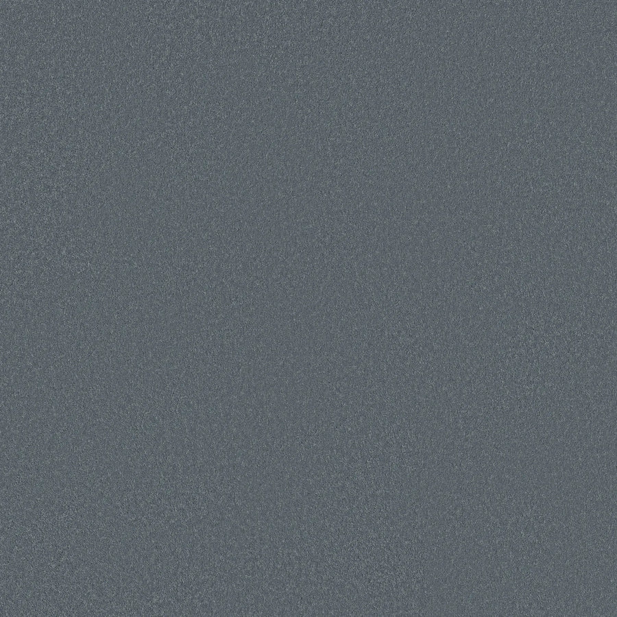 The Smooth Tone Blue Pet Friendly Carpet in South Pacific features a grainy, blue-gray texture resembling digital static, with no distinct shapes—ideal for adding a unique yet luxurious touch to any floor.