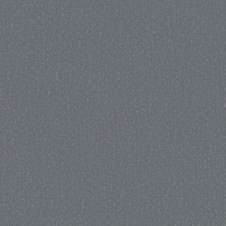 A close-up of Crafted Tone Pet Friendly Carpet in South Pacific shows a durable blue-gray woven texture with subtle color variation—perfect for those seeking stain-resistant carpet.