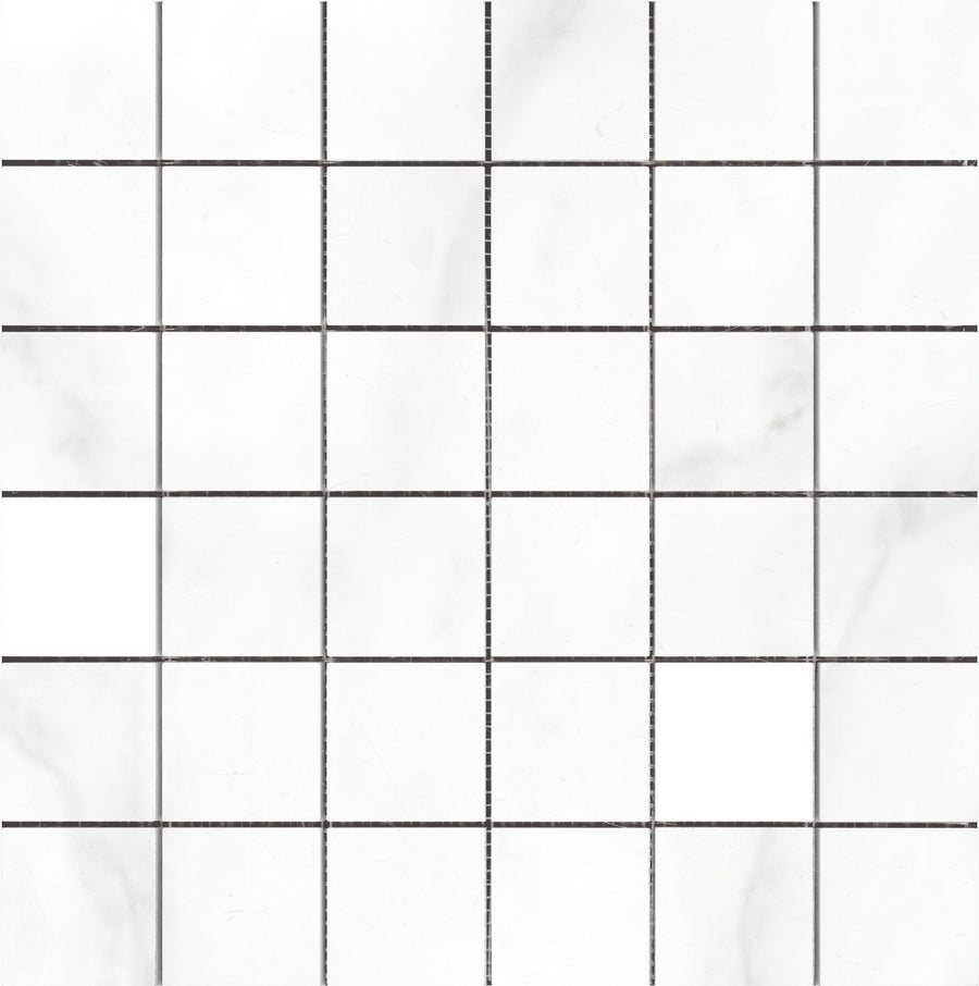 The Statuario Bianco 2x2 Mosaic Porcelain Tile features a white marble-look with a matte finish, subtle gray veining, and thin dark grout lines for a minimal, clean geometric pattern.