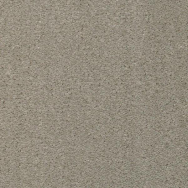 Close-up of Seduction On Trend Carpet in Stepping Stone color, featuring a light beige, textured surface with a tightly woven loop pile. The carpet appears soft and uniform, with subtle shading variations from the fibers.