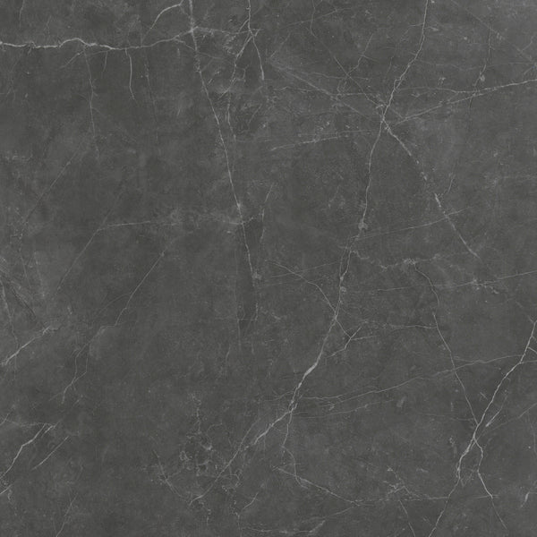 The Callie 12x12 Ceramic Tile in Smoke features natural white and light gray veining on a dark gray surface, creating an elegant, textured look.