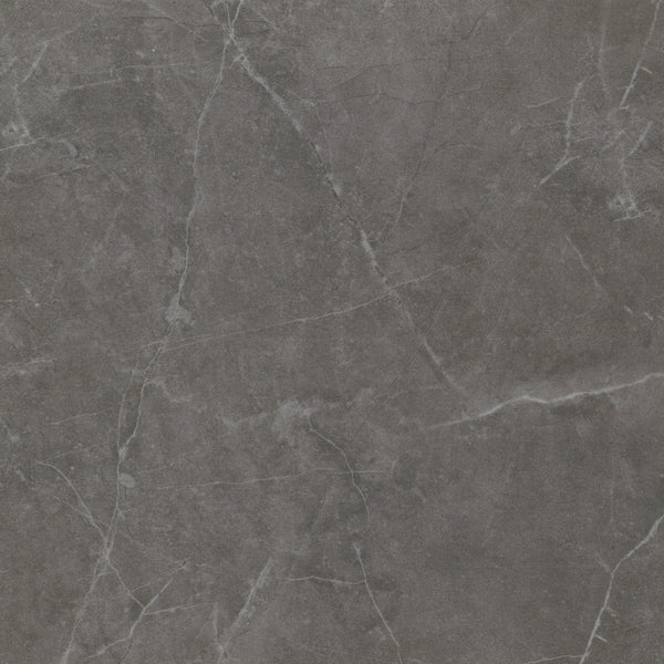 The Callie 24x24 Polished Porcelain Tile in Smoke features a dark gray marble look with white and light gray veining, offering luxury and elegance for floors, countertops, or wall tiling in any space.