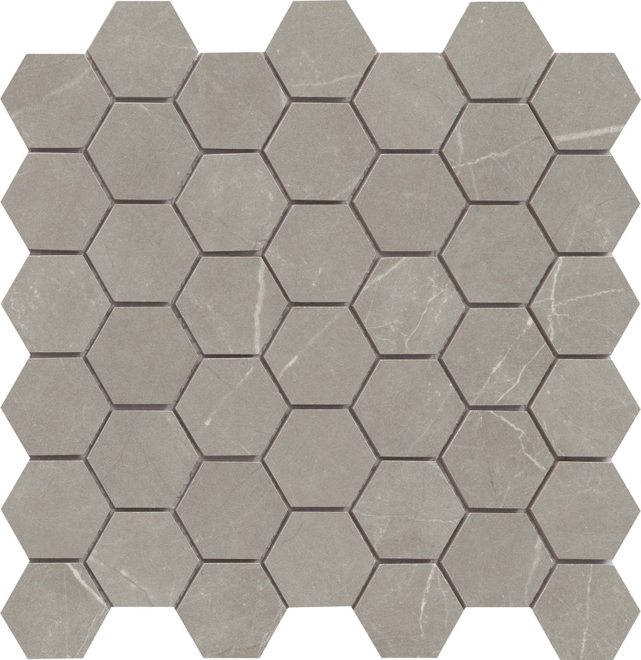 Callie 2" Hexagon Porcelain Mosaic in Fog features a honeycomb pattern, subtle white veining, and natural stone texture for a luxurious look.